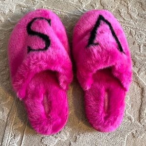 magenta victoria secret slippers with a V and S in a size medium never worn